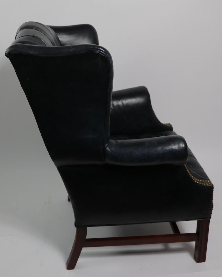 American Tufted Leather Chippendale Style Wing Chair