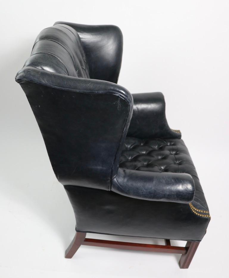 20th Century Tufted Leather Chippendale Style Wing Chair