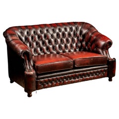 Tufted Leather Oxblood Loveseat by Thomas Lloyd