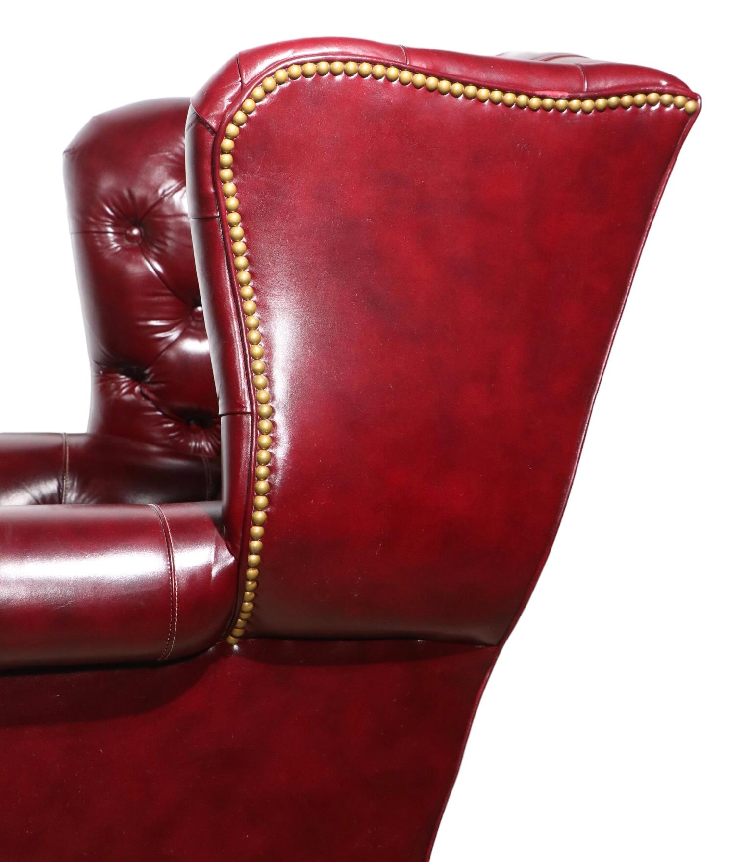 Tufted Leather Wing Chair and Ottoman by Leathercraft Inc. 4