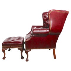 Tufted Leather Wing Chair and Ottoman by Leathercraft Inc.