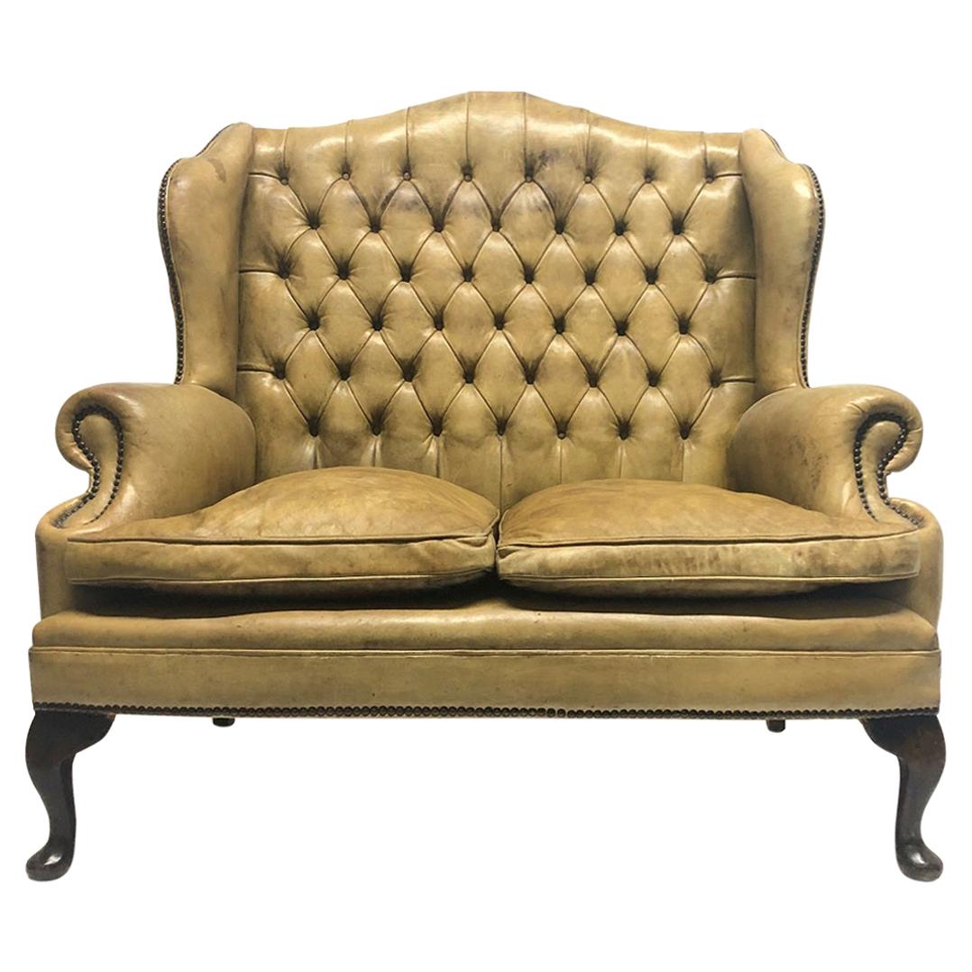 Tufted Leather Wingback Loveseat in the Style of Chippendale