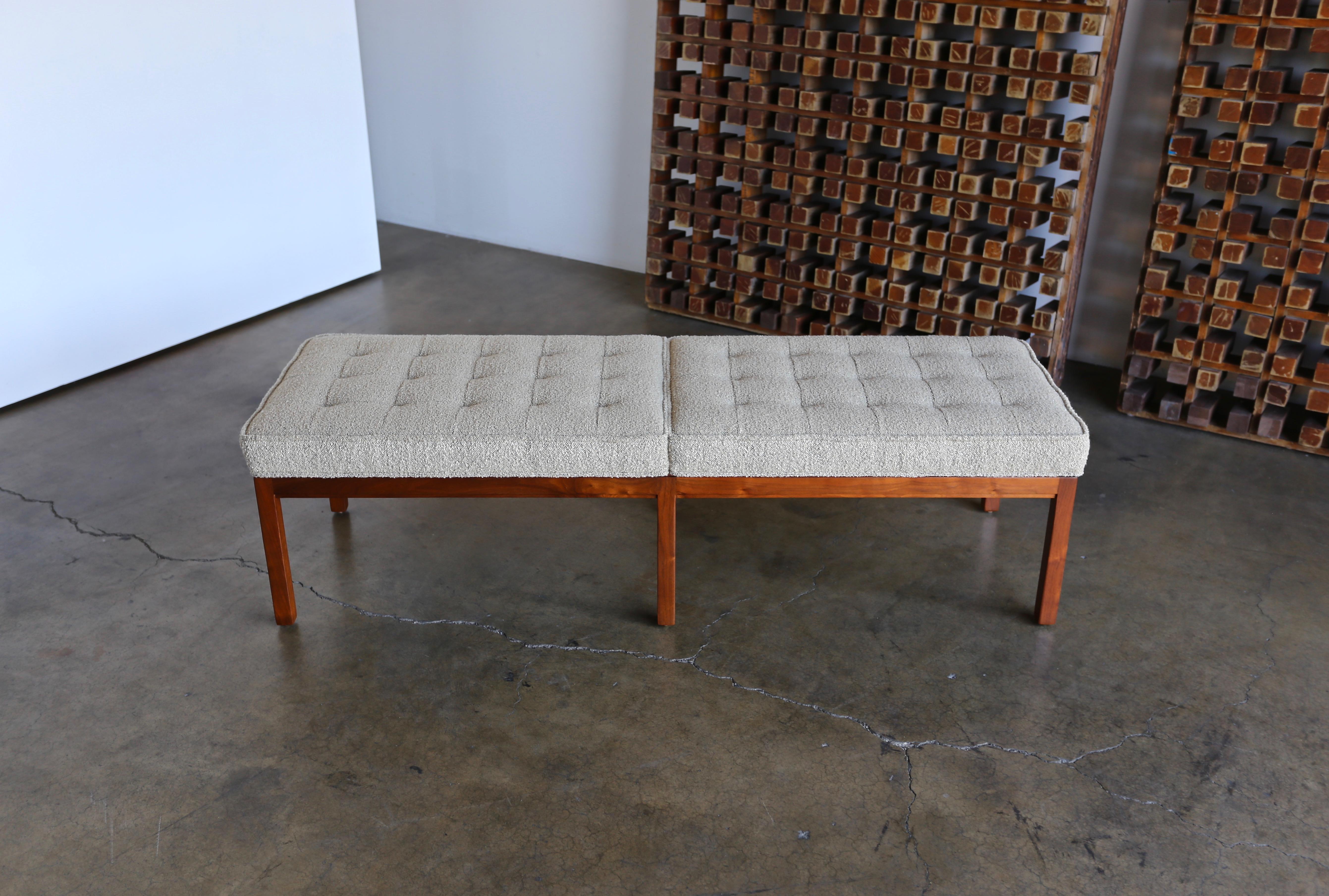 Tufted nubby fabric and walnut bench by Metropolitan Furniture Co. This bench has been professionally restored.