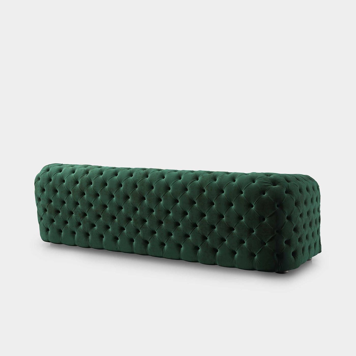 green tufted sofa