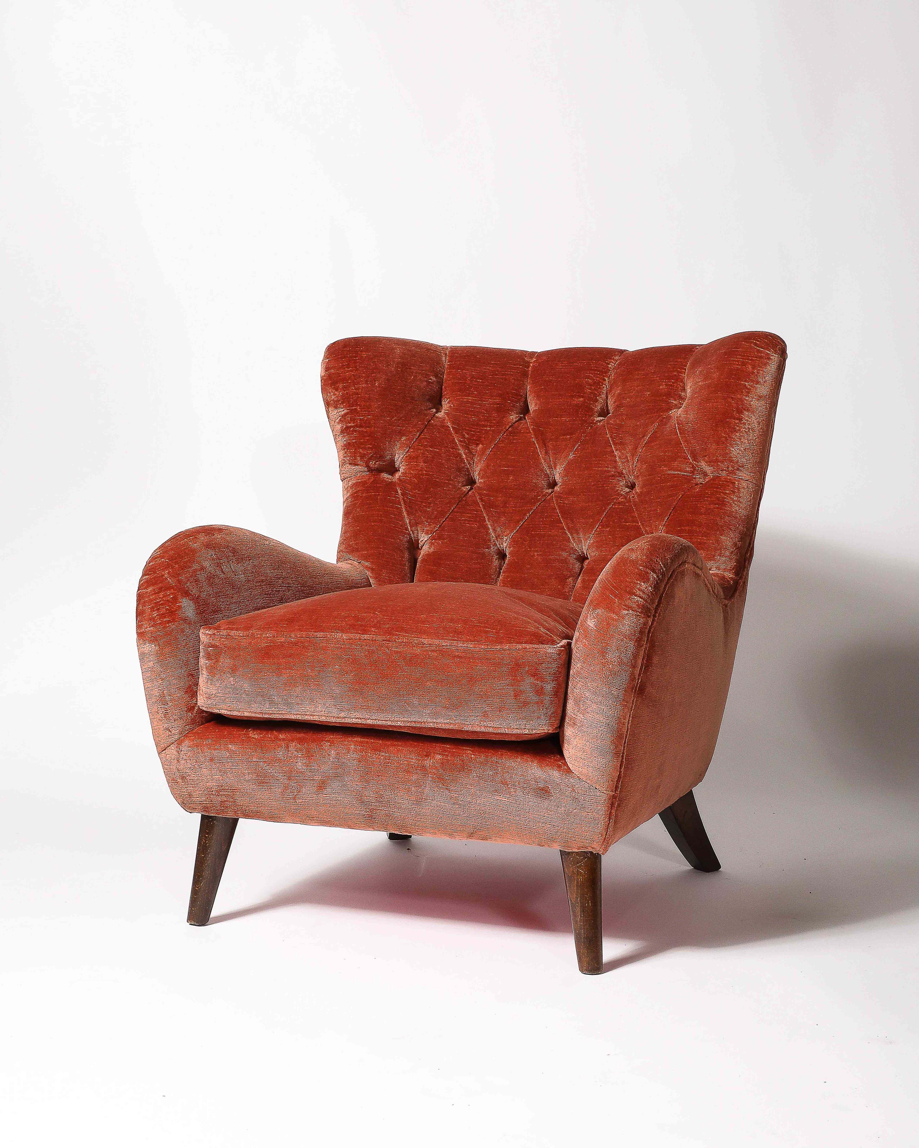 Medium, overstuffed tufted armchairs. Very comfortable with lots of character. Excellent vintage condition.