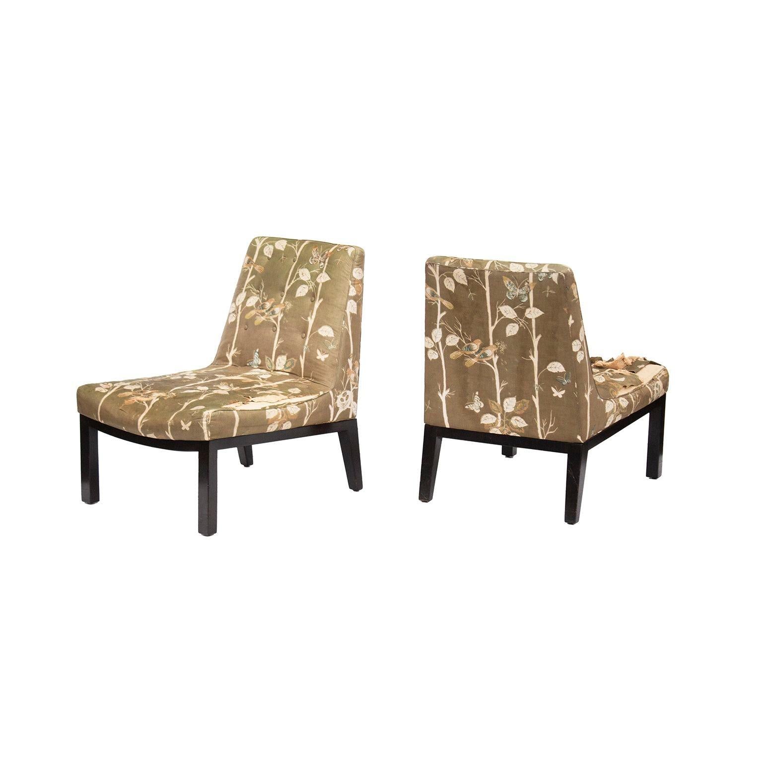 USA, 1950s
Pair of slipper chairs by Edward Wormley for Dunbar. Beautiful details on this design with curving front frame and deep and dimensional hardwood frames. Both are signed with metal Dunbar placard on the underside. In original upholstery,