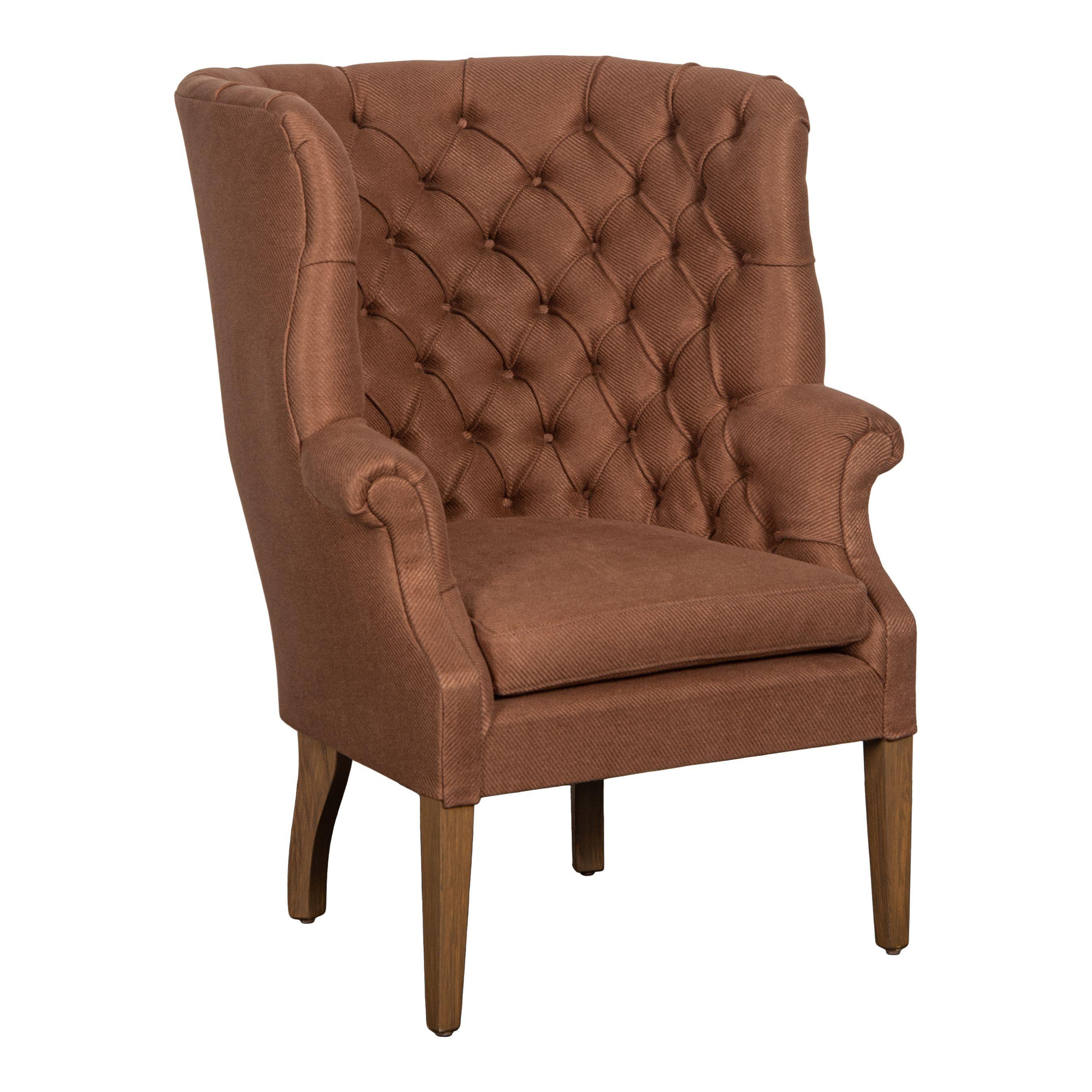 Poltroncine wingback vintage con struttura in tessuto di lino color ruggine e importate dalla Francia. Questo set di sedie è stato recentemente tappezzato e presenta un bel colore ruggine scuro e un tessuto di lino testurizzato. Le gambe sono in
