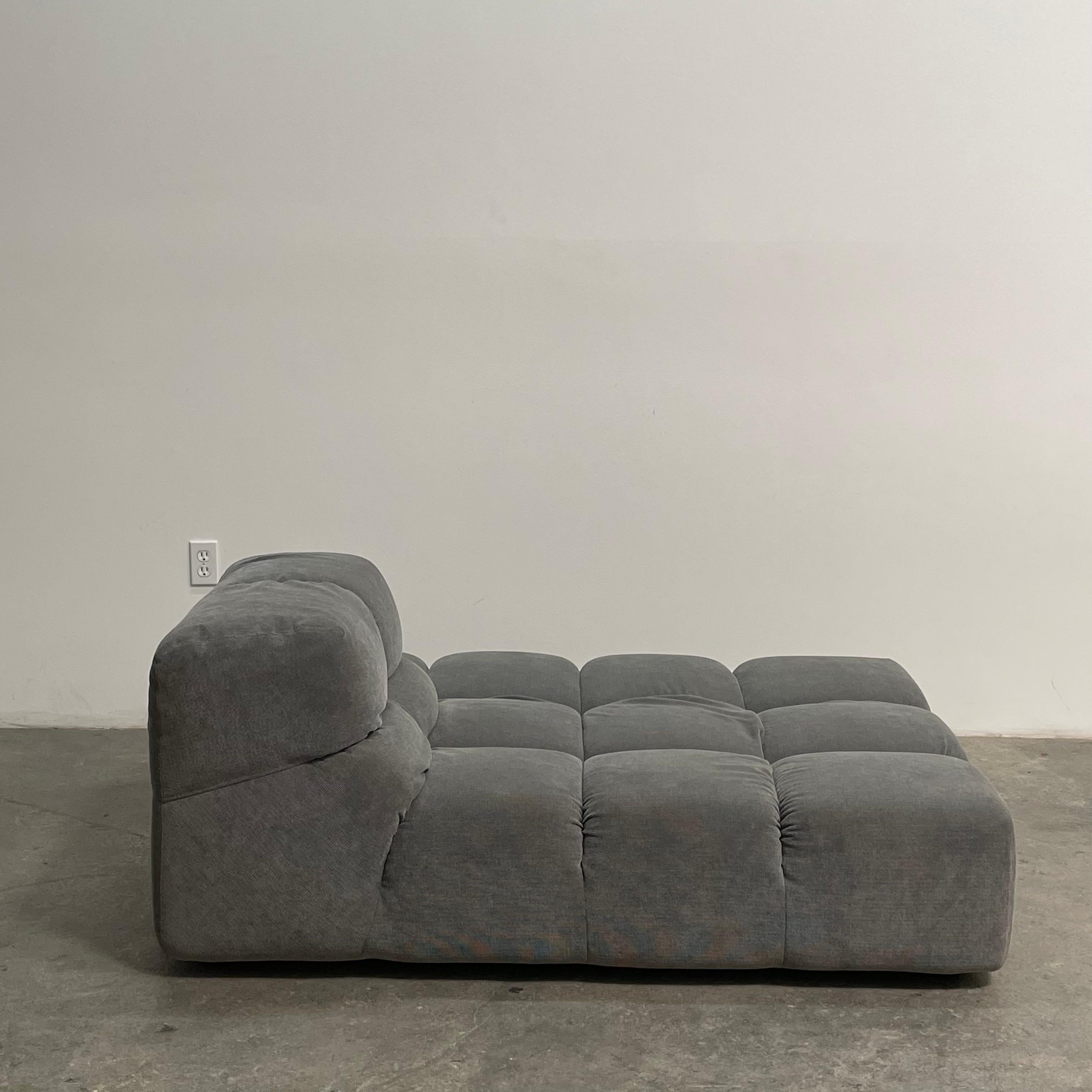 The Tufty-Time sofa series, designed by Patricia Urquiola for B&B Italia, is a modern take on traditional Chesterfield sofas.

The modular system starts with an ottoman, which is then accompanied by central, corner and terminal elements with a low