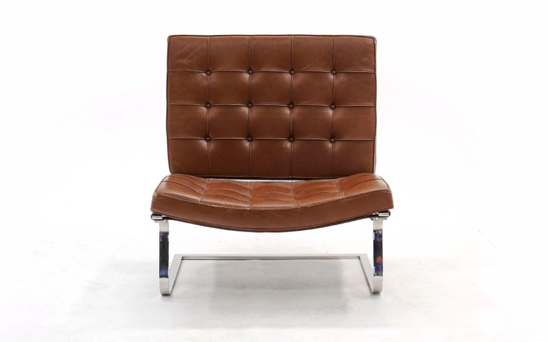 Tugendhat chair in brown leather and stainless steel designed by Ludwig Mies van der Rohe and manufactured by Knoll. This original example is in very good condition with very few signs of wear.
  
