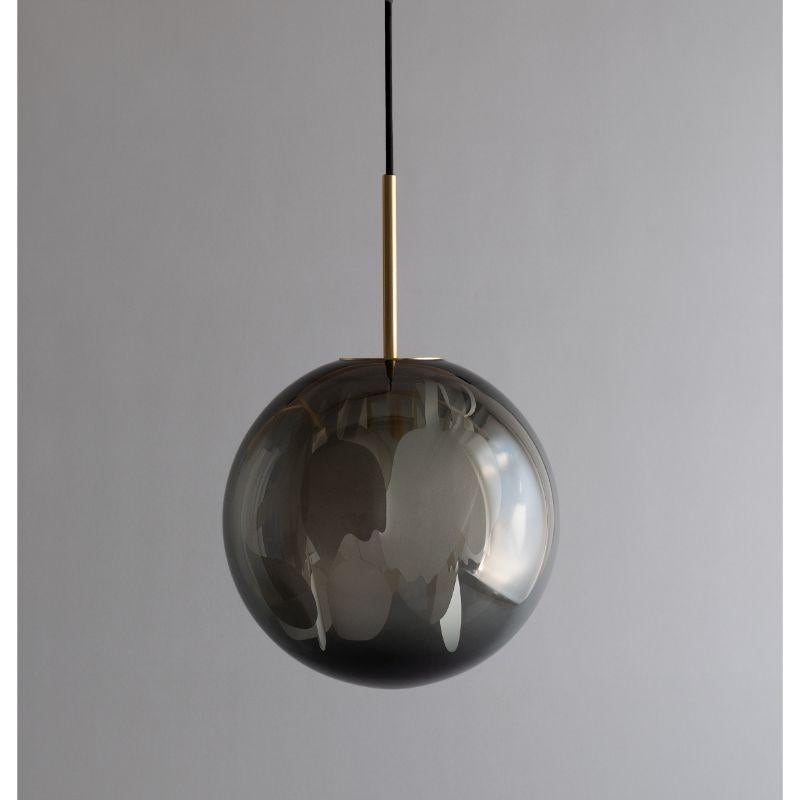 Tulip 2 pendant light by Lina Rincon
Dimensions: H30 x 30 x 30 cm
Materials: Blown Glass, Brass

All our lamps can be wired according to each country. If sold to the USA it will be wired for the USA for instance.

Colors and dimensions may