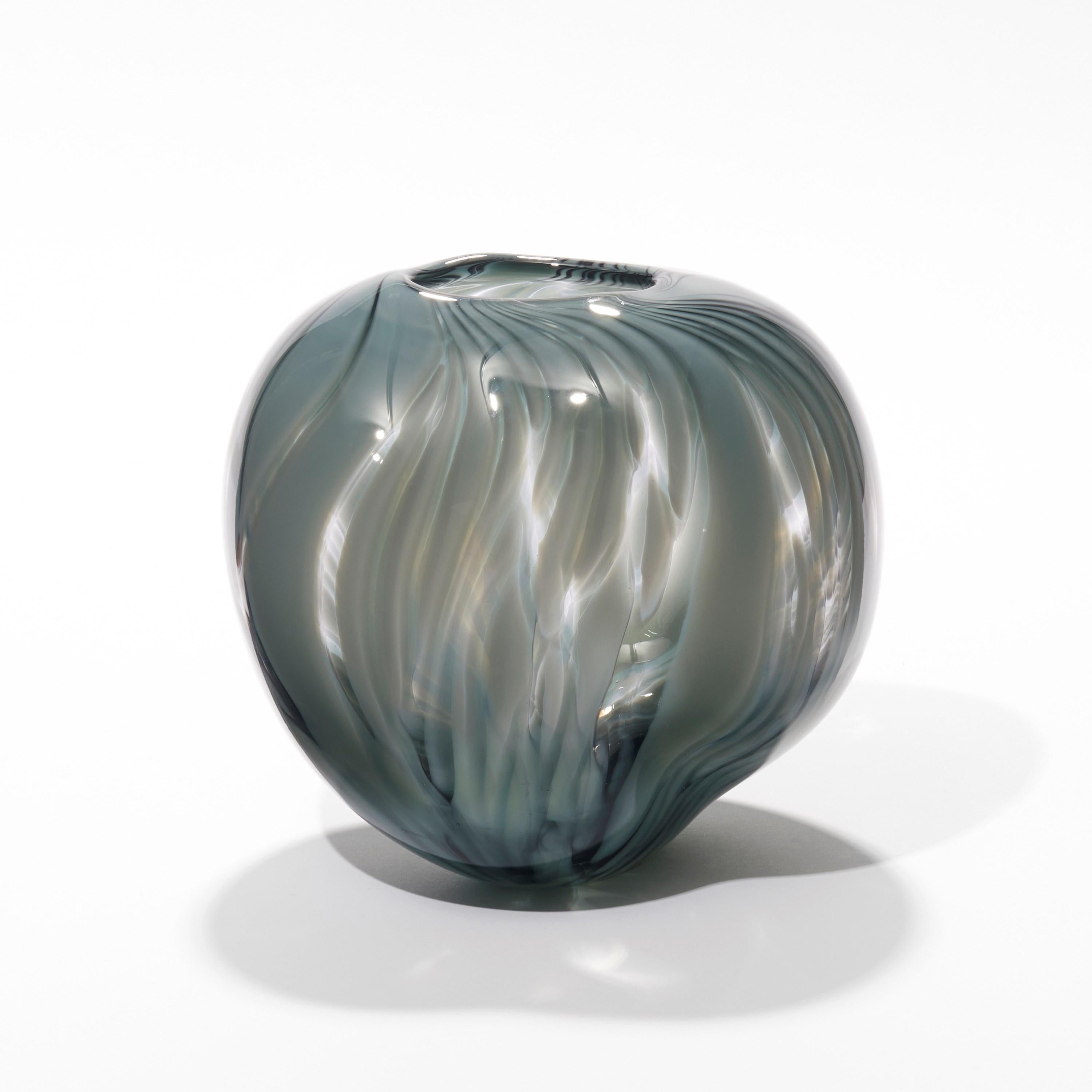 'Tulip Bud' is a unique glass artwork by the Canadian artist, Michèle Oberdieck.

Michèle Oberdieck explores balance and asymmetry through colour, form and surface decoration. Presenting her sculptural works as a gesture, an expressive mark, often