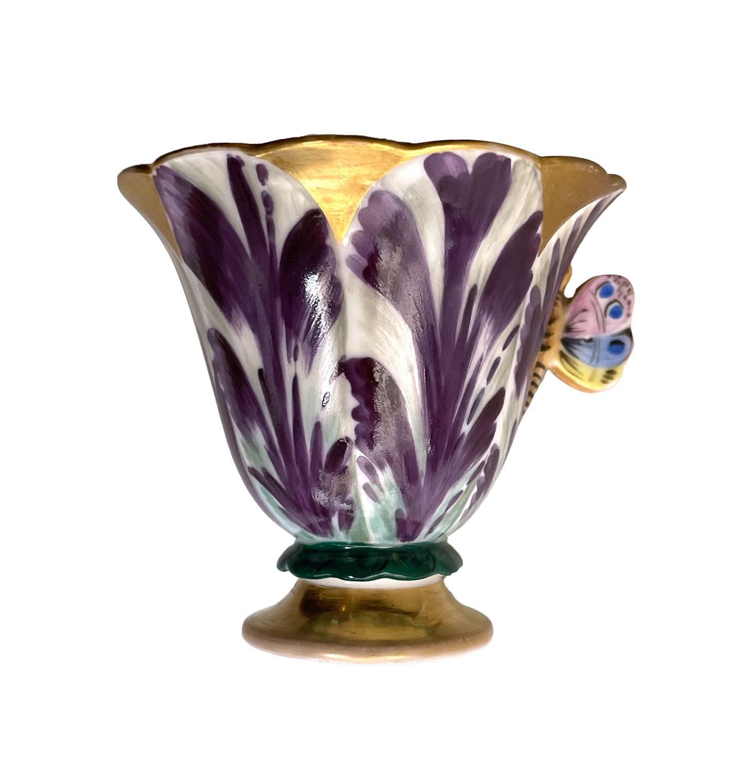 Tulip-shaped cup with its saucer in Old Paris Porcelain. Hand-painted pieces with lovely purple and white shades, in the shape of a tulip flower. Very delicate piece with a butterfly-shaped handle, edges slightly scalloped, reminding a flower shape.