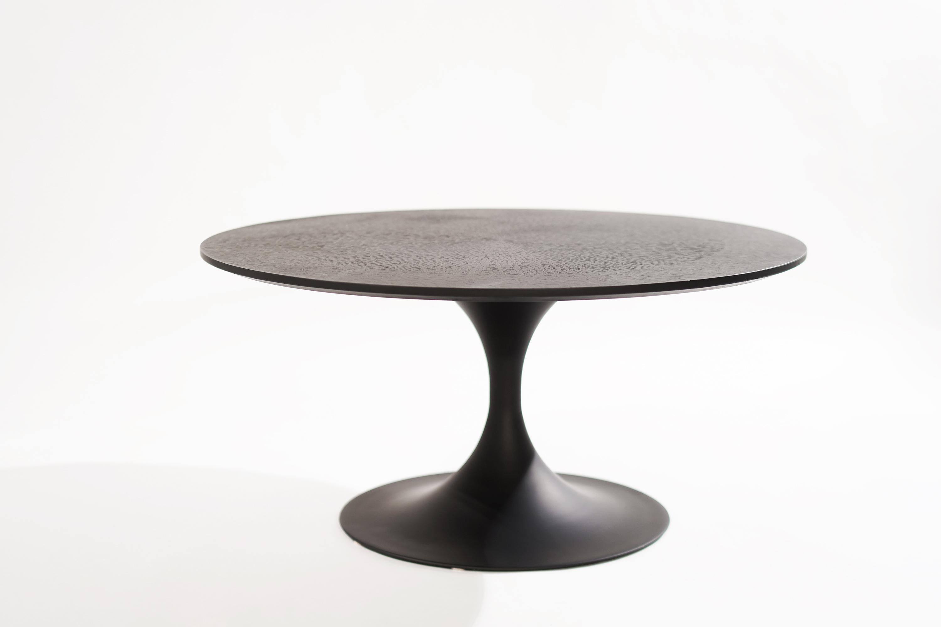 Tulip coffee table in the style of Eero Saarinen for Knoll (unmarked), circa 1950-1959. 
Completely restored, with an unusual textured top.

Other designers from this period include Milo Baughman, Vladimir Kagan, Hans Wegner, Gio Ponti, and Ico