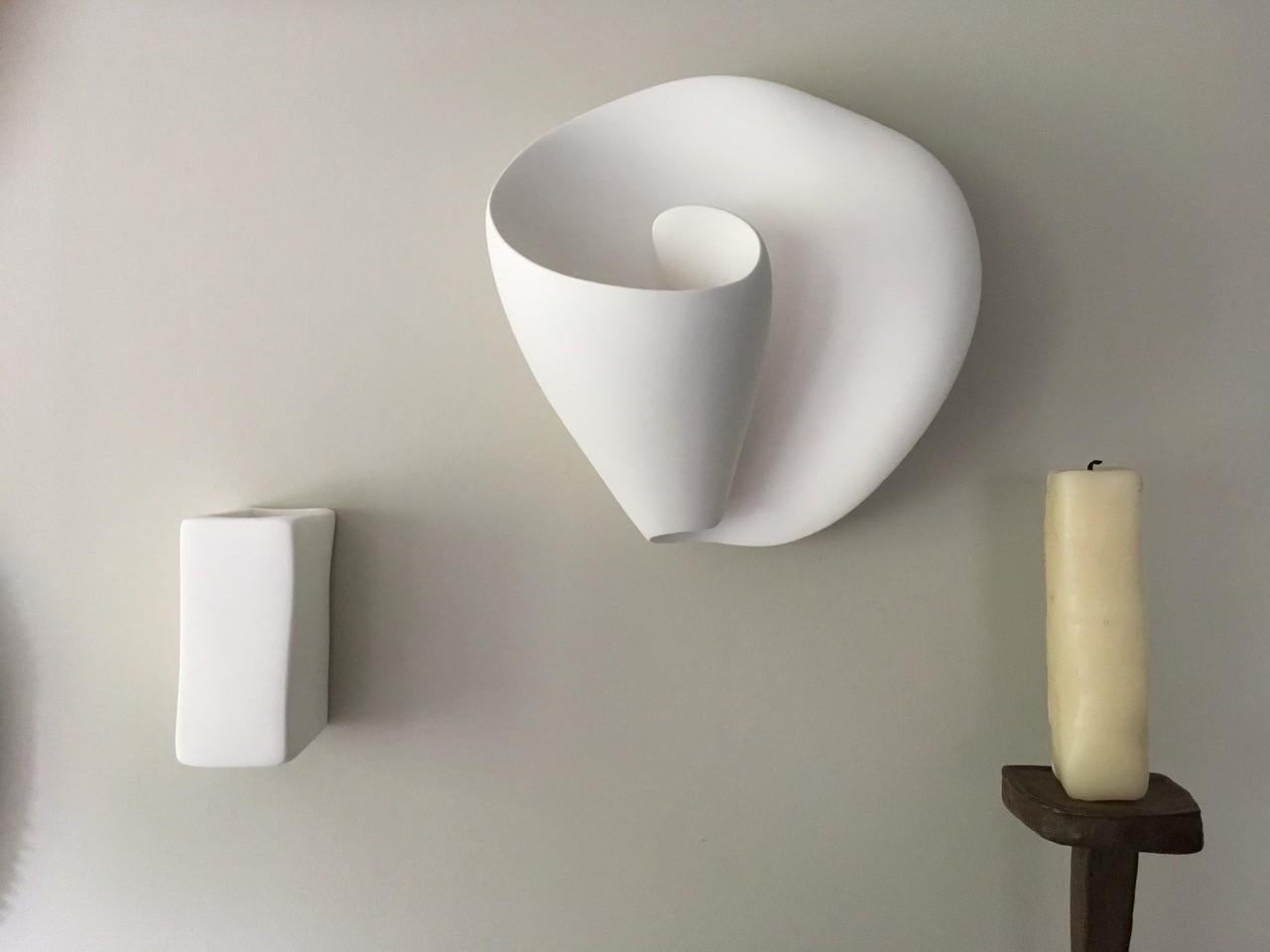 white wall sculptures