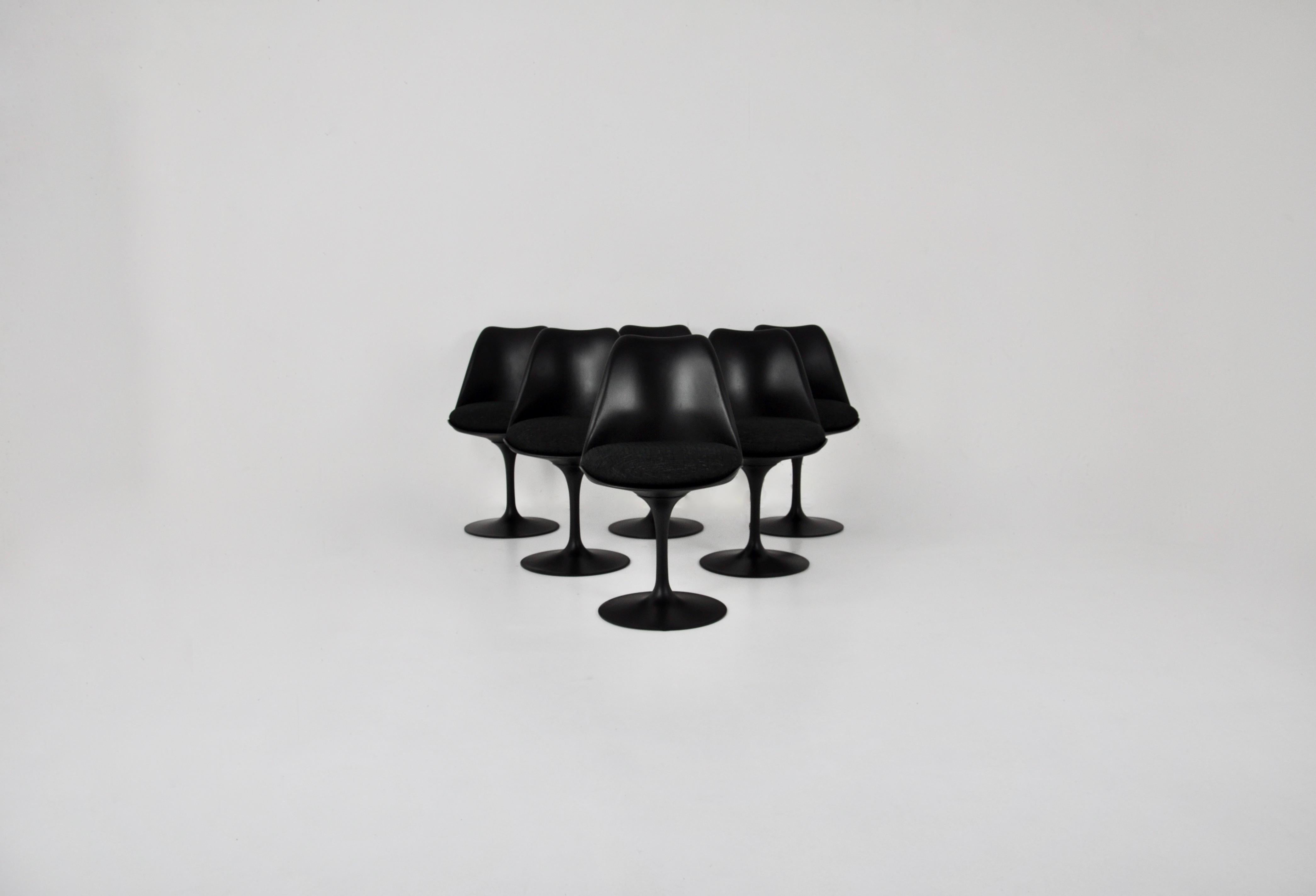 Set of 6 chairs in fibreglass, aluminium and fabric. Seat height 45 cm. The chairs are black and the fabric is black. Wear and tear due to time and age of the chairs.