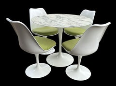 Tulip Dining suite of Marble top table and 4 swivel chairs by Saarinen for Knoll