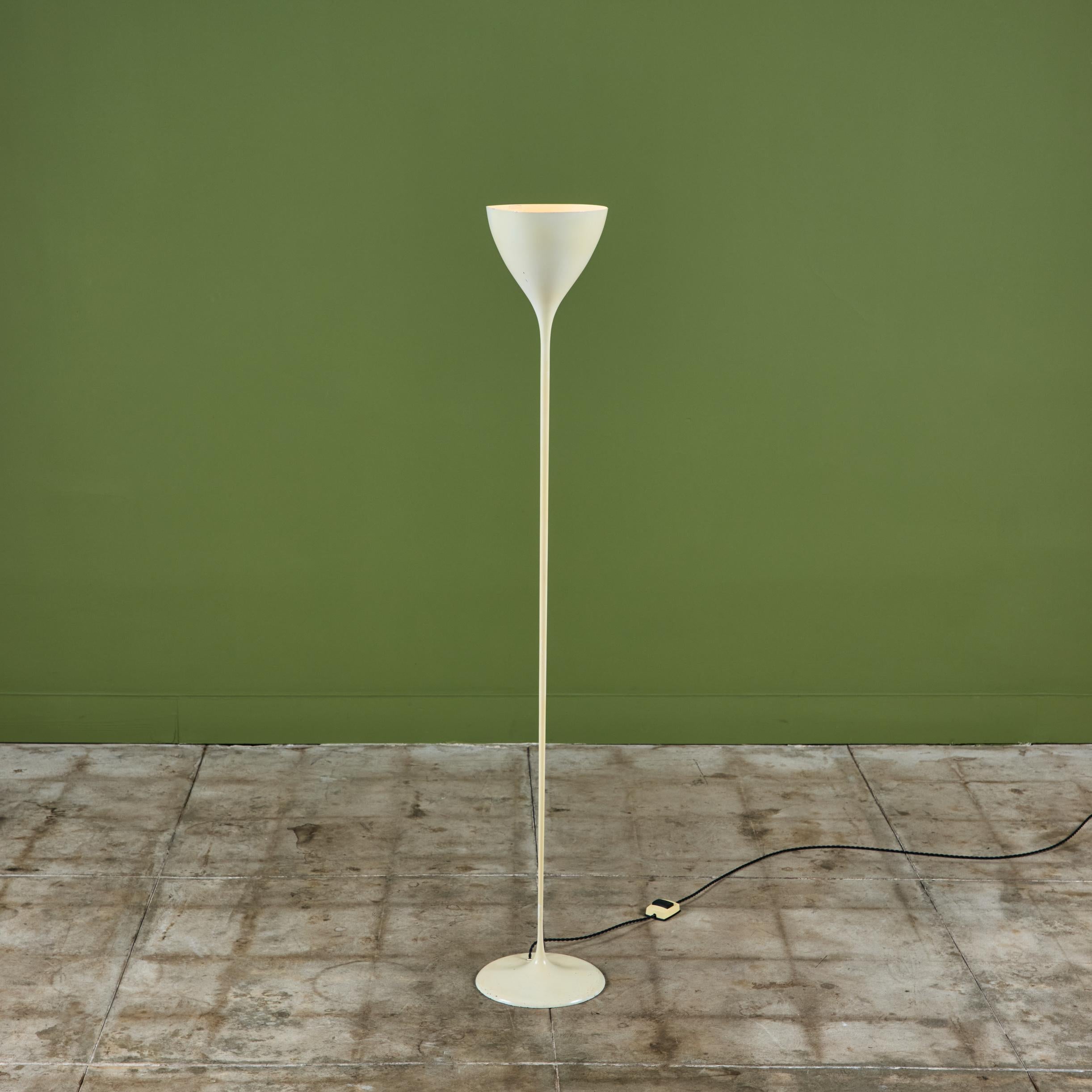 White enamel floor lamp by Max Bill, c.1950s Switzerland. The modern lamp features a tulip shaped shade that directs light upwards with a long dainty stem and an on/off switch peddle switch on the original wiring.
Two available. Priced