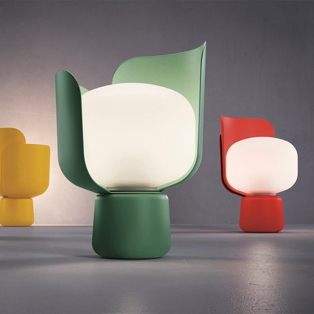 Table lamp tulip green with structure in solid aluminium powder-coated
in green color finish and with lamp shade diffuser made of milk-white and 
opaline polyethylene.
Also available on request in yellow, or red, or white, or blue, or black color