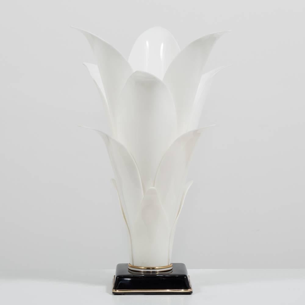 Tulip shaped acrylic lamp by Rougier 1970s.

Although there is little documented about the Canadian designer Roger Rougier we know that their designs were produced between 1970-1980. Most famously specialising in lamps, their designs depict organic