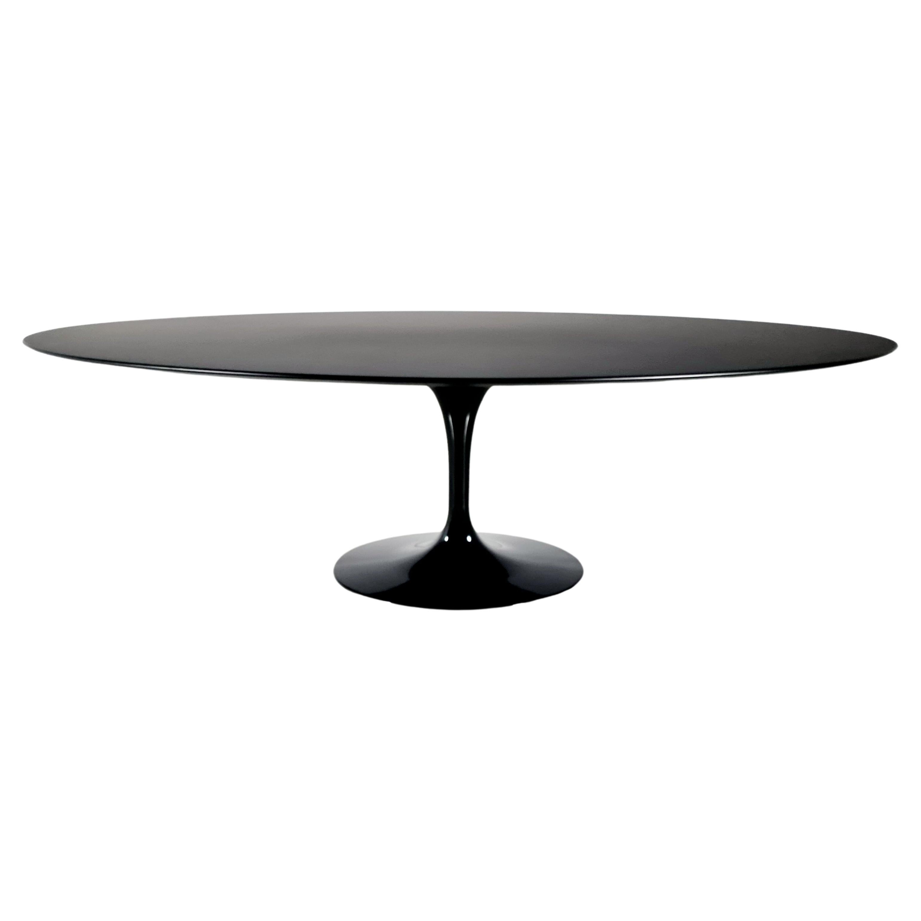 Eero Saarinen Walnut Tulip Table for Knoll at 1stDibs