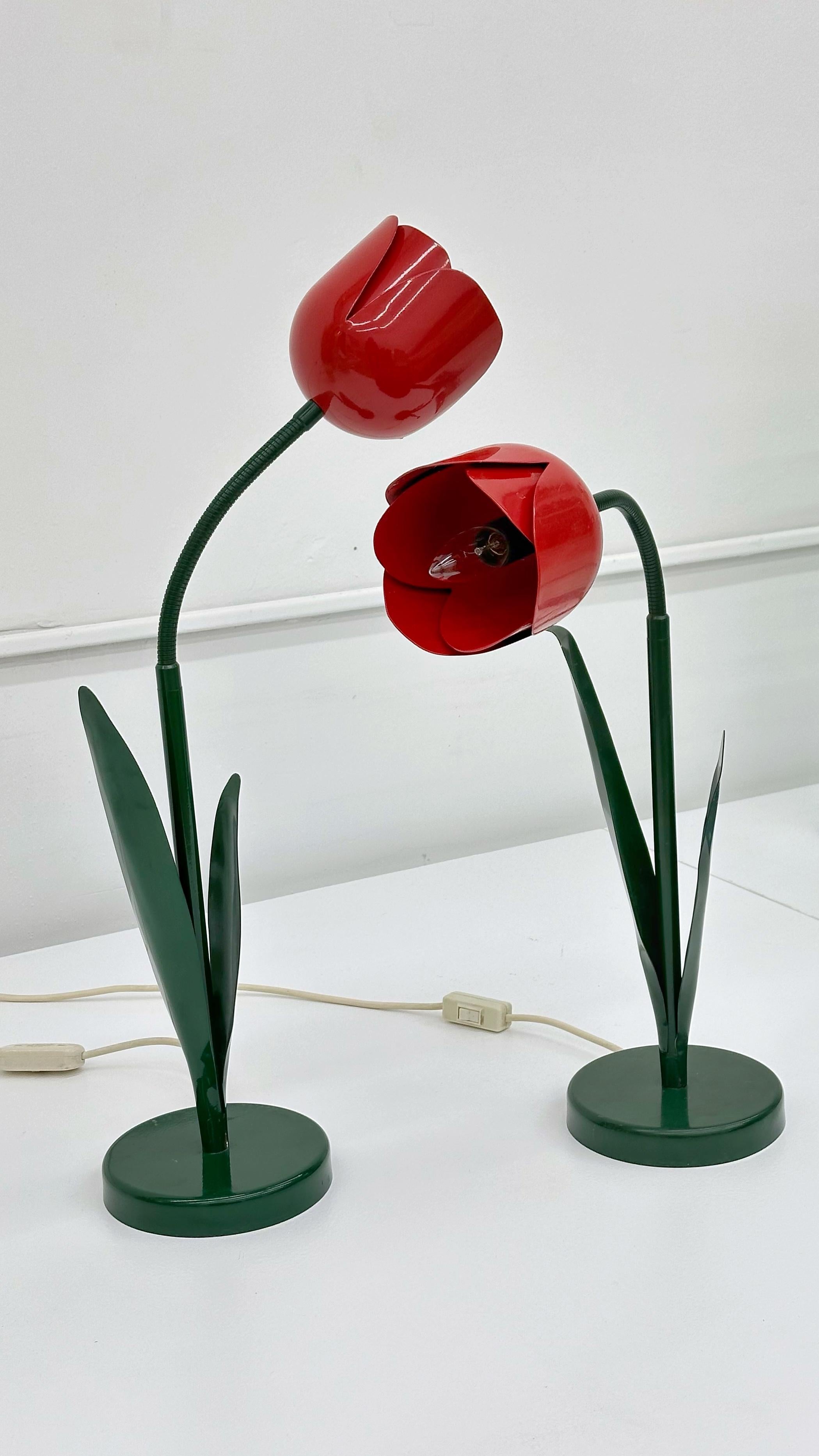 UK, 1984-85. Imported to Chicago in 1989 by Peter Chiswick. Whimsical red tulip crafted of a steel base with aluminum shade and adjustable gooseneck.