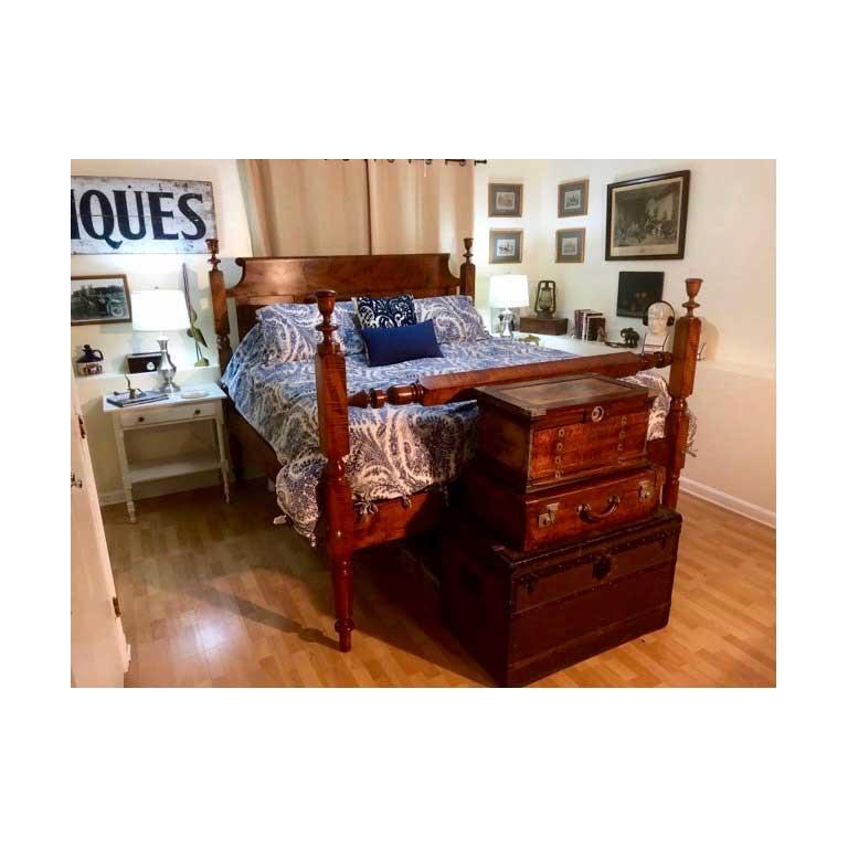 Tulip top Empire bed in Tiger maple refitted to a standard King with tri-paneled, chamfered roll back headboard, circa 1820. Original blanket rail salvaged and extended to fit. Provenance: North Shore Massachusetts Estate. Measures: 2