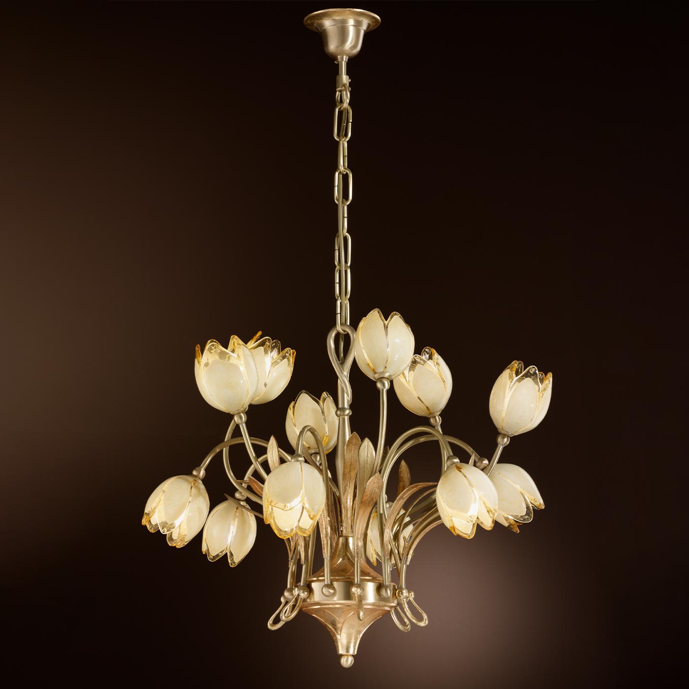 Feminine and graceful, this superb golden brass chandelier recalls a generous bouquet of tulips in bloom. Fluidly extending from the central body, stem-like arms sustain mouth-blown amber glass shades shaped like buds where the lightbulbs are
