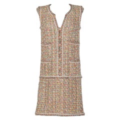 Robe en tweed de tulle et lurex avec bouton bijou Chanel