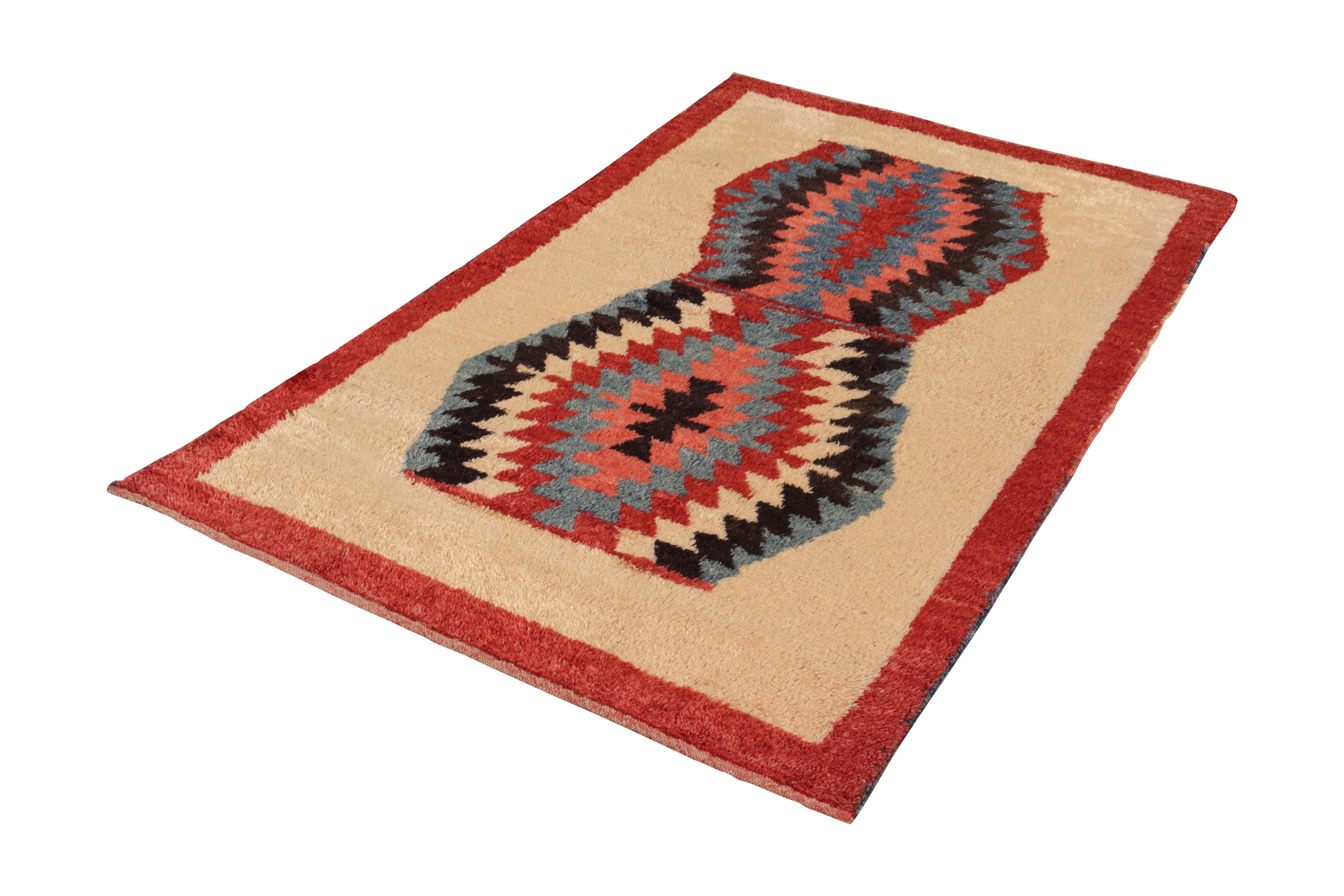 This hand knotted tribal rug represents a Tulu style design from the Modern Classics collection by Rug & Kilim, a variety of celebrated Classic rug styles recaptured with modern and contemporary quality since the inception of the line in the 1980s.