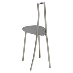 Stuhl „Tumble“ aus rostfreiem Stahlrohr und poliertem Sitz.