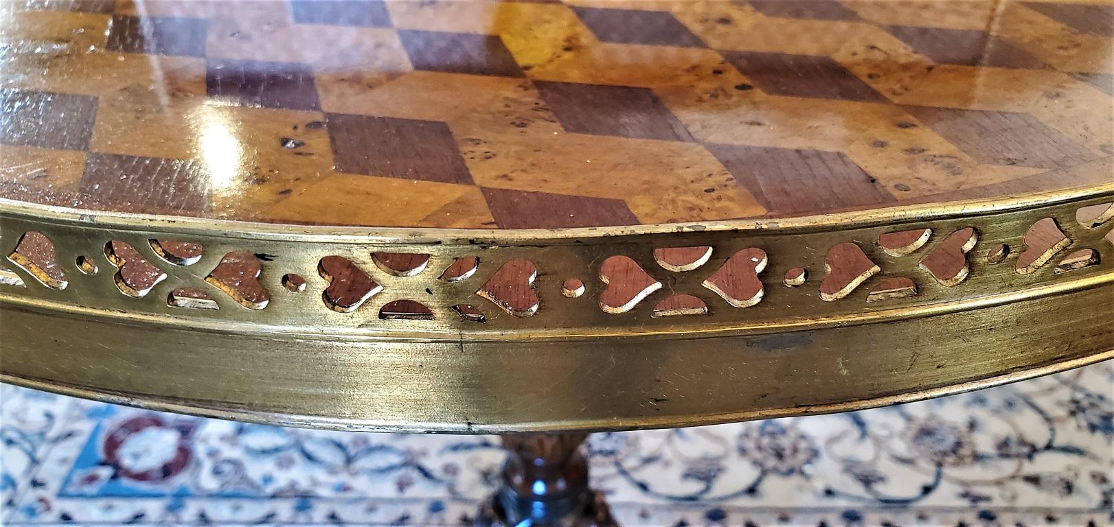 Presenting a lovely tumble block parquetry inlay galleried walnut tripod table,

circa 1980 and probably made by either Maitland-Smith or Theodore Alexander.

High quality reproduction of a Classic early 19th century side or occasional