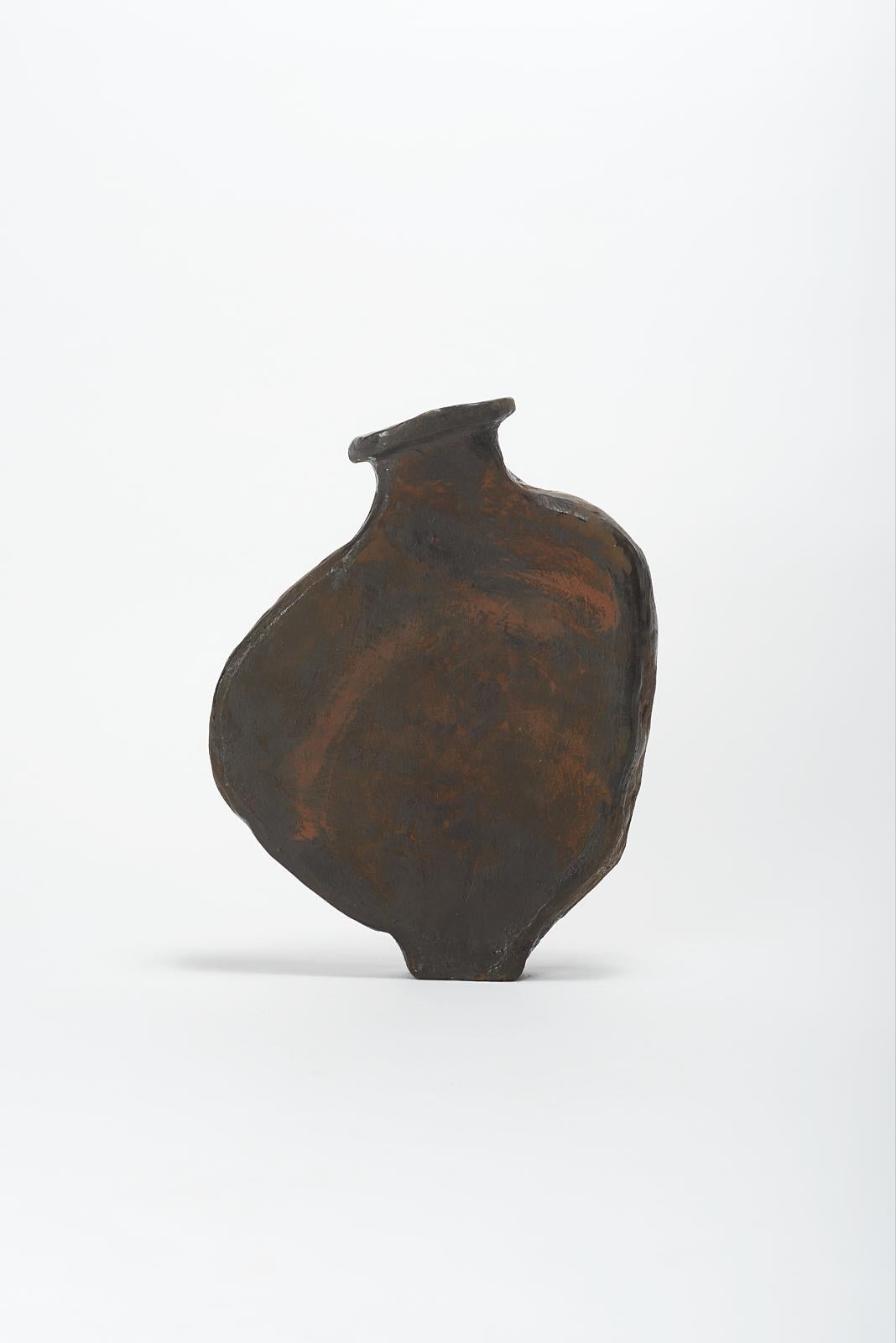 Tumbo Vase by Willem Van Hooff
Core Vessel Series
Dimensions: W 26 x D 10 x H 36 cm (Dimensions may vary as pieces are hand-made and might present slight variations in sizes)
Materials: Earthenware, ceramic, pigments, glaze.

Core is a series of
