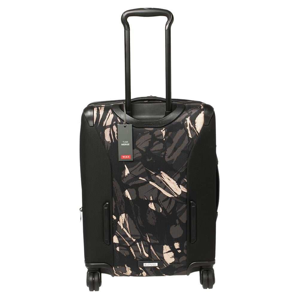 TUMI's wide collection of the best travel accessories includes this Merge Continental Expandable Carry On luggage case with the Highlands print. Delivering on the idea of a seamless travel experience, the luggage case is crafted from nylon and