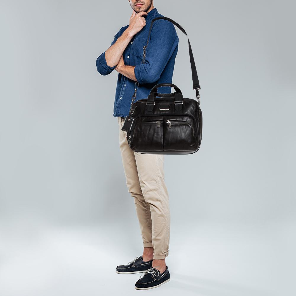 tumi leather handbag