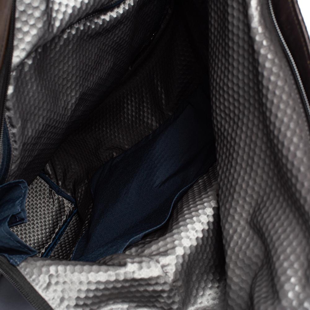 TUMI Black/Metallic Bronze Leather Alpha Bravo London Roll Top Backpack In Excellent Condition In Dubai, Al Qouz 2