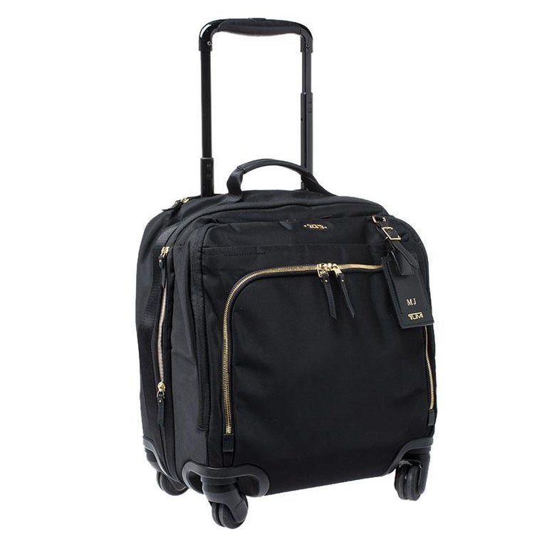 tumi black luggage