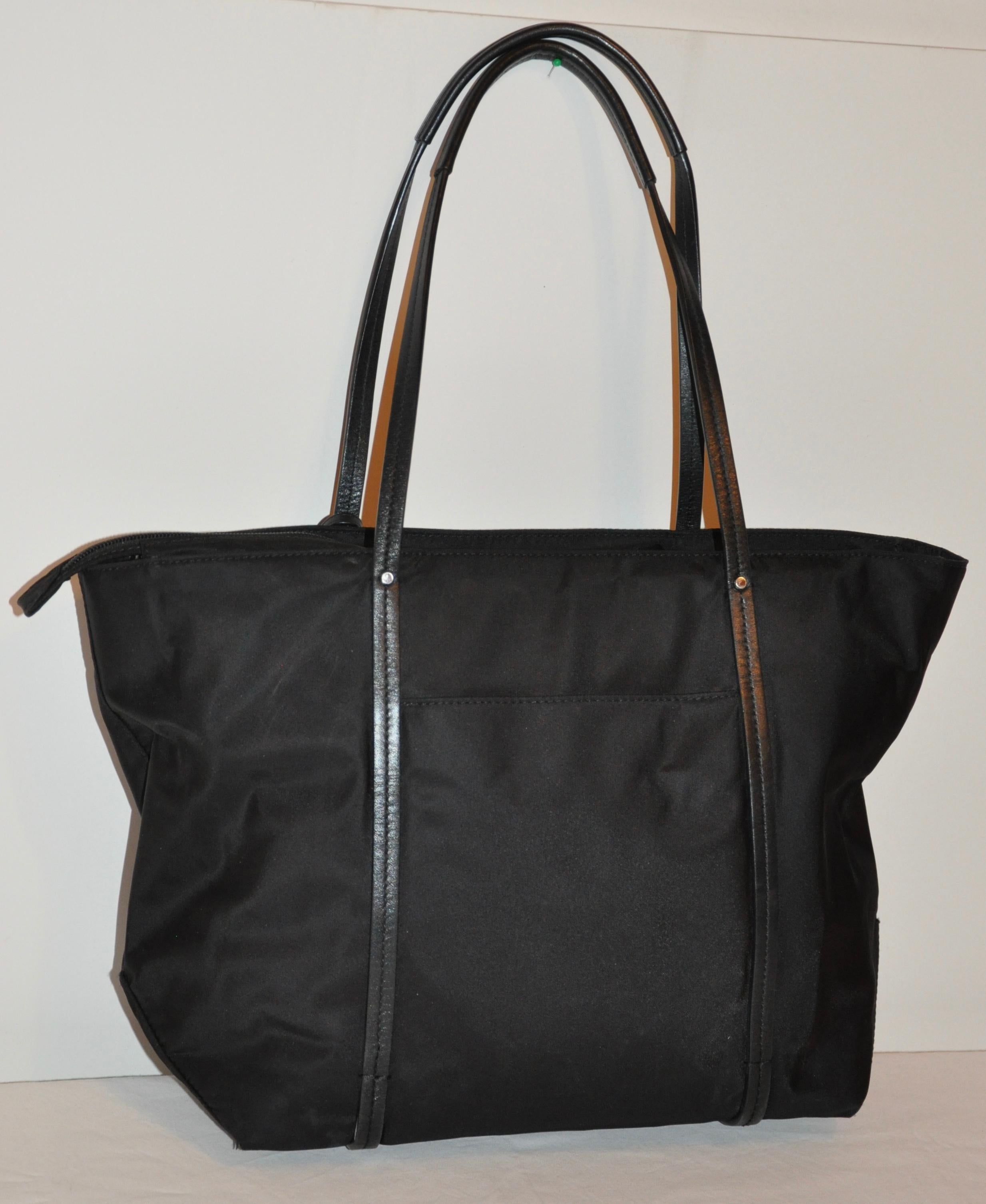 Tumi Black Nylon Accented with Black Calfskin Travel Tote In Good Condition For Sale In New York, NY