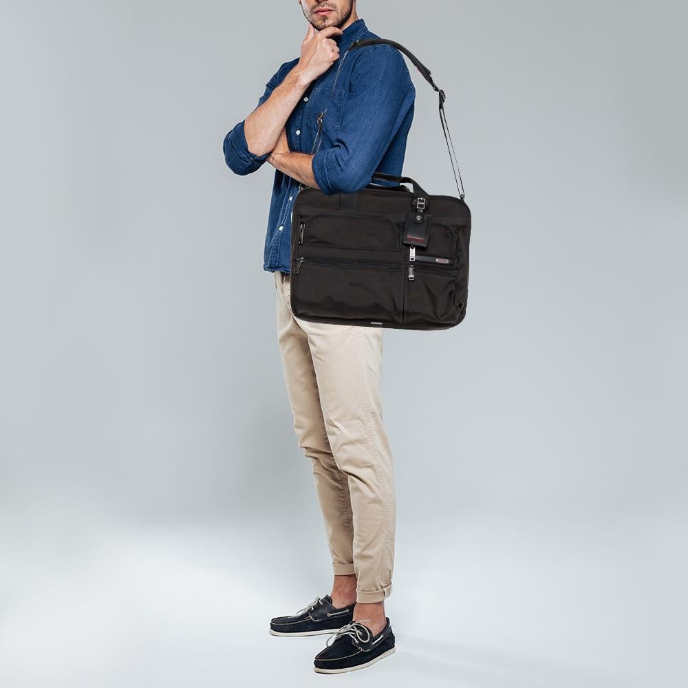 Employing high-grade materials and innovative construction to deliver impeccable products that aim at functional ease, TUMI is the brand travelers can trust. This laptop briefcase is crafted in nylon as well as leather and equipped with multiple