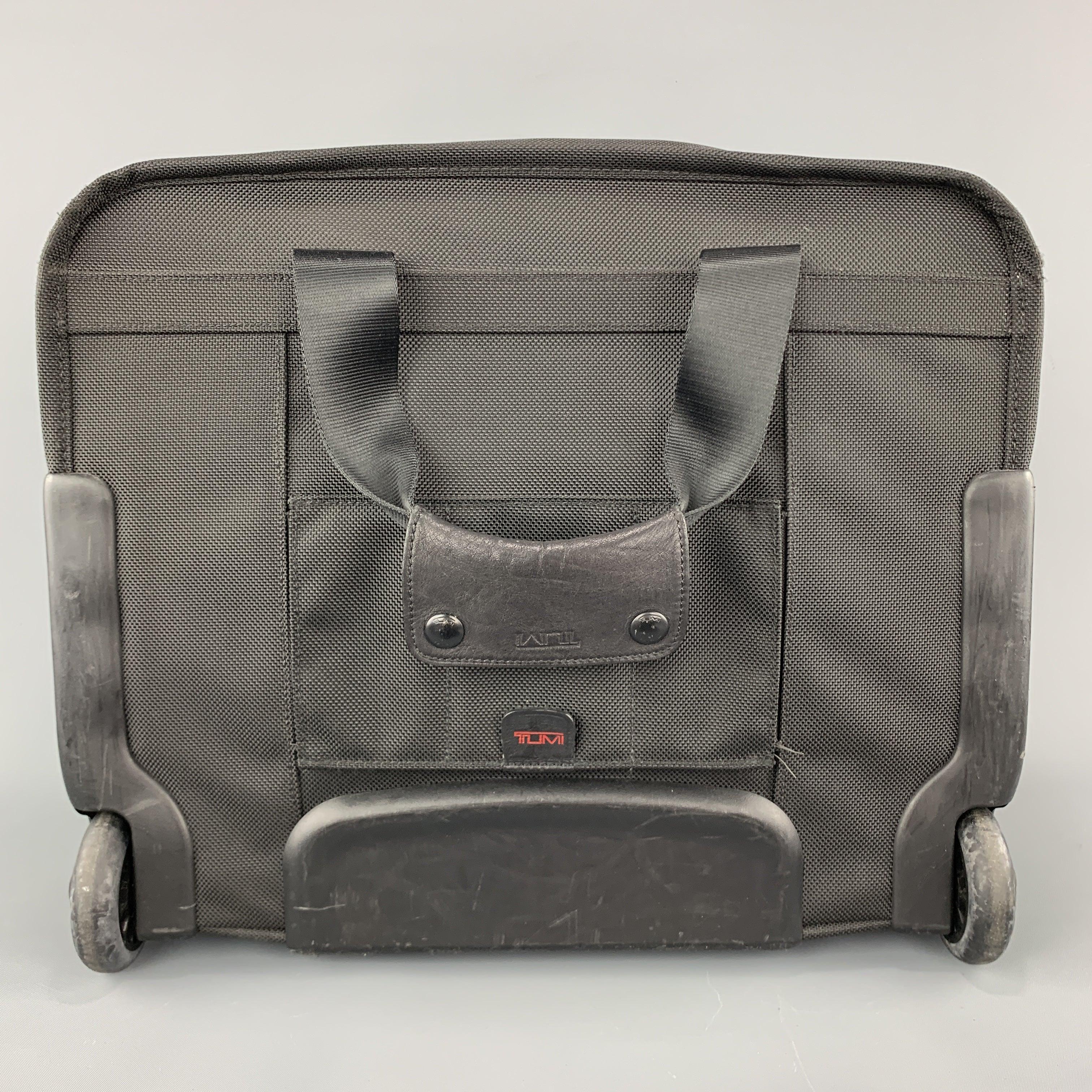 TUMI Black Nylon Canvas Roller Suitcase For Sale 2