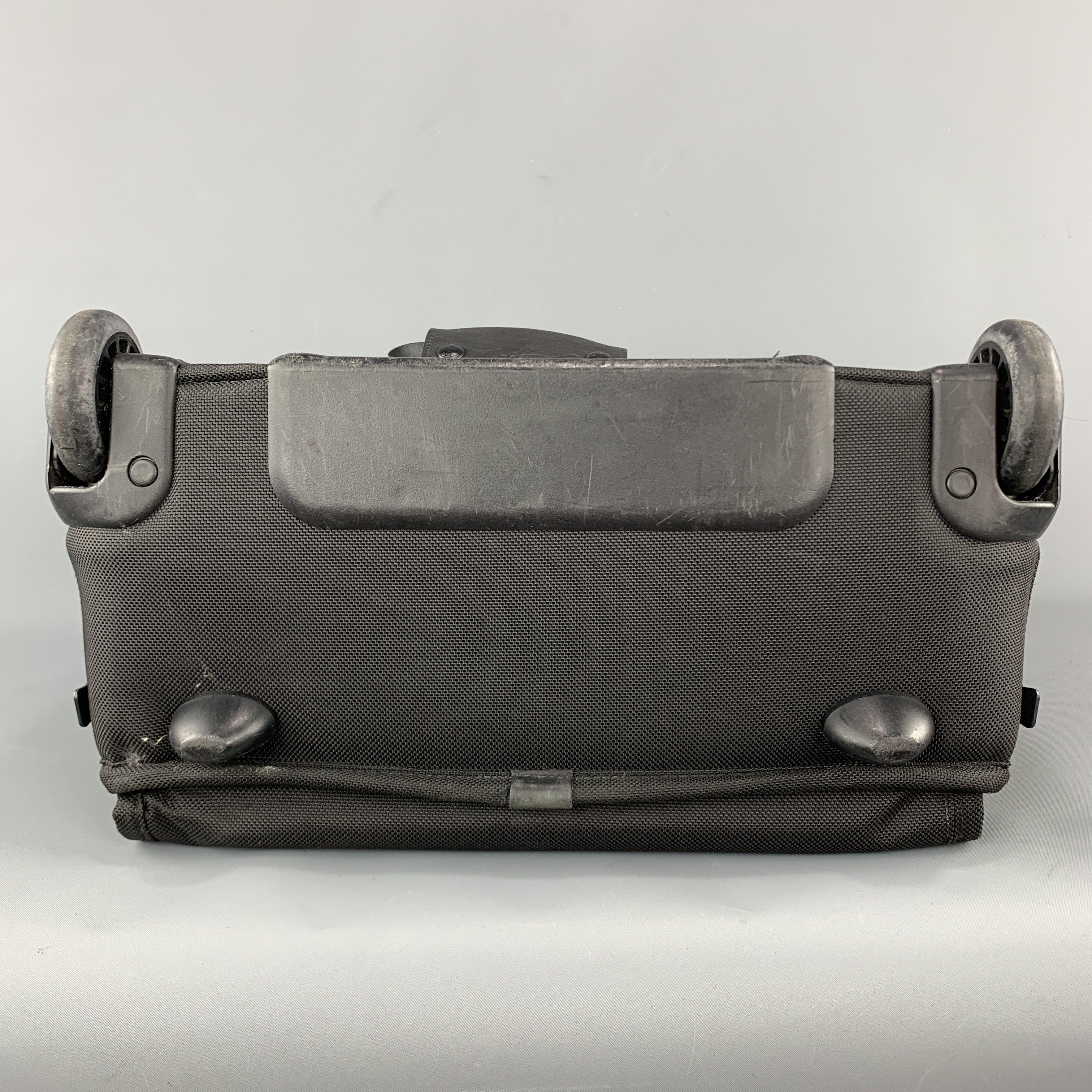 TUMI Black Nylon Canvas Roller Suitcase For Sale 4