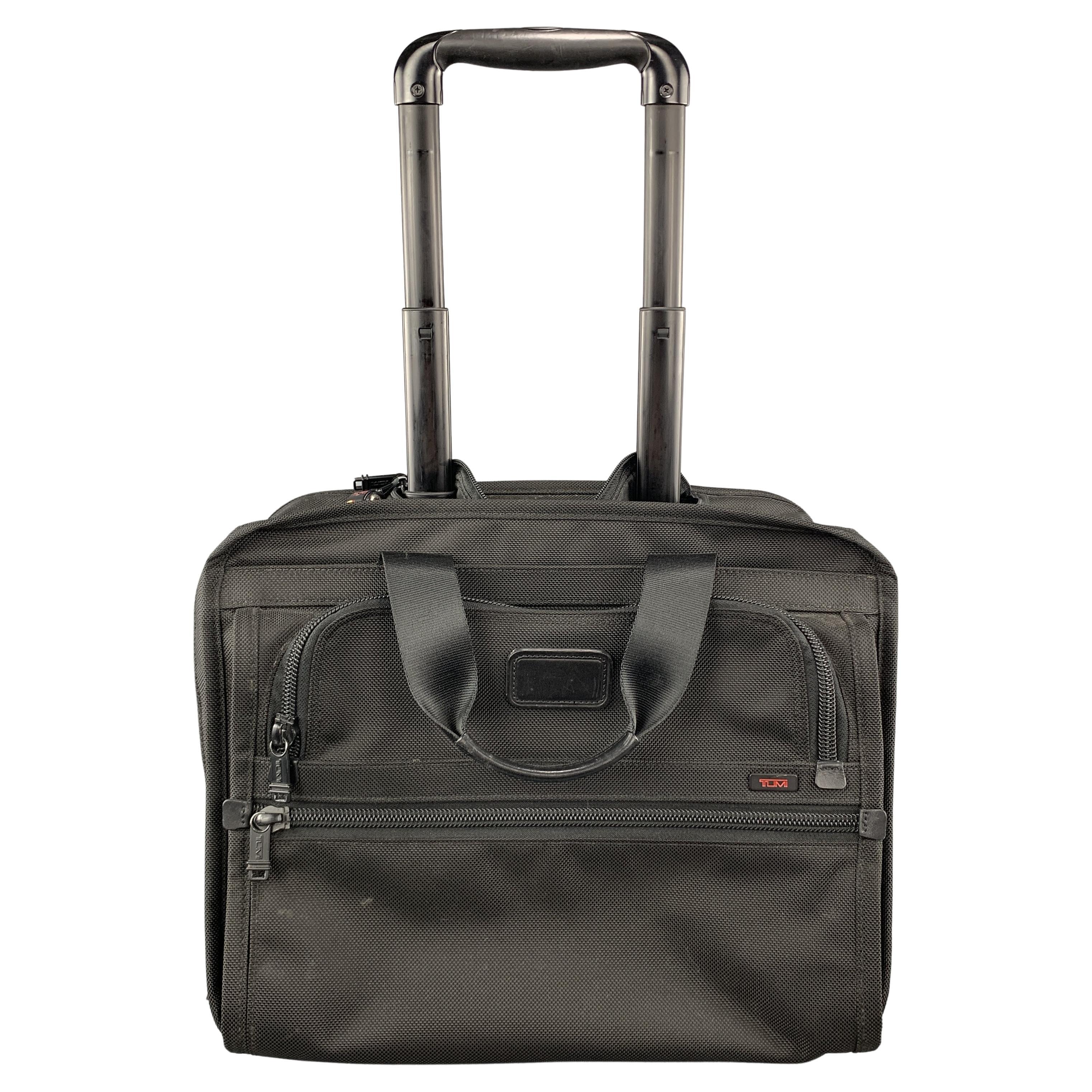 TUMI Black Nylon Canvas Roller Suitcase For Sale