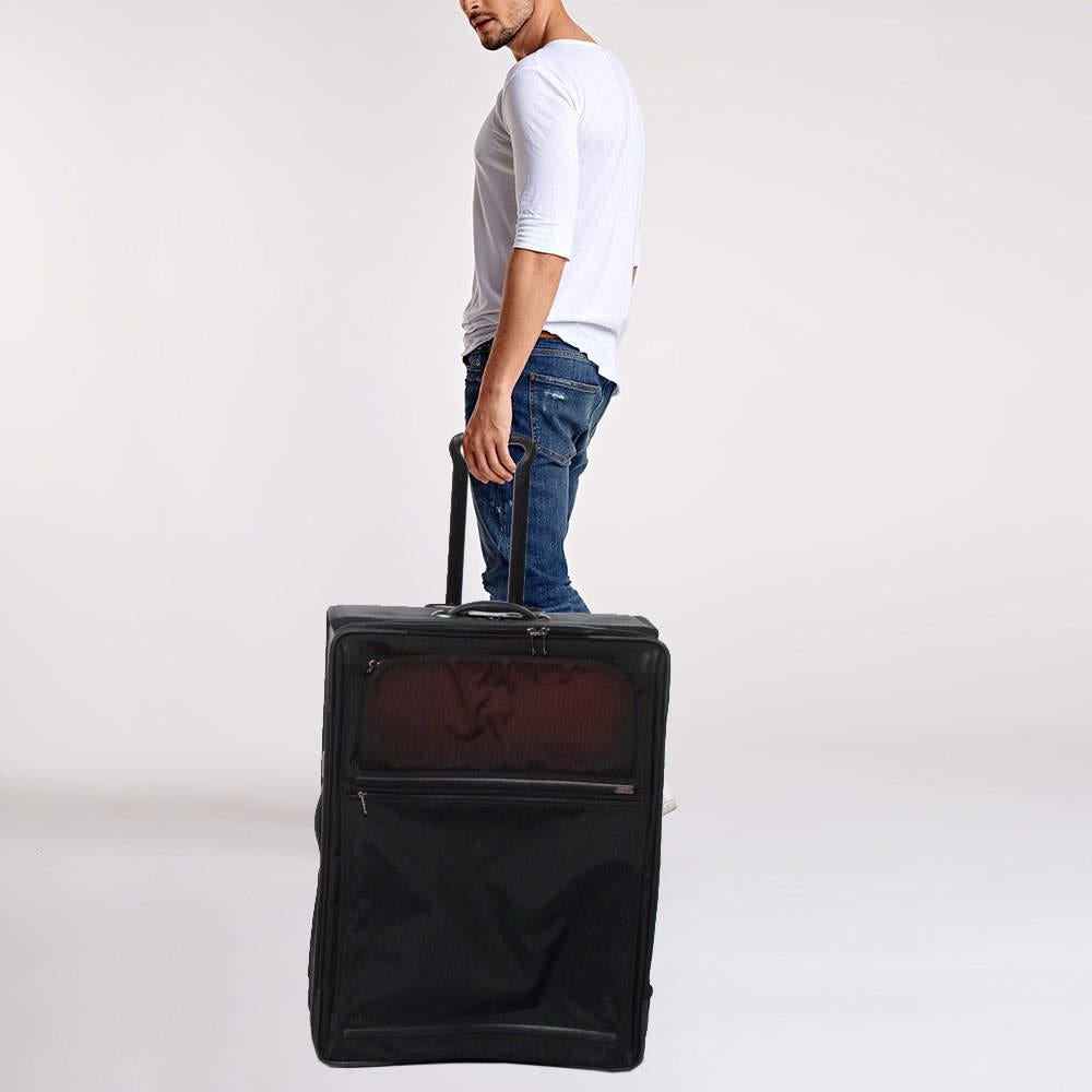 Employing high-grade materials and innovative construction to deliver impeccable products that aim at functional ease, TUMI is the brand travelers can trust. This expandable suitcase is crafted in nylon and equipped with multiple pockets, a spacious