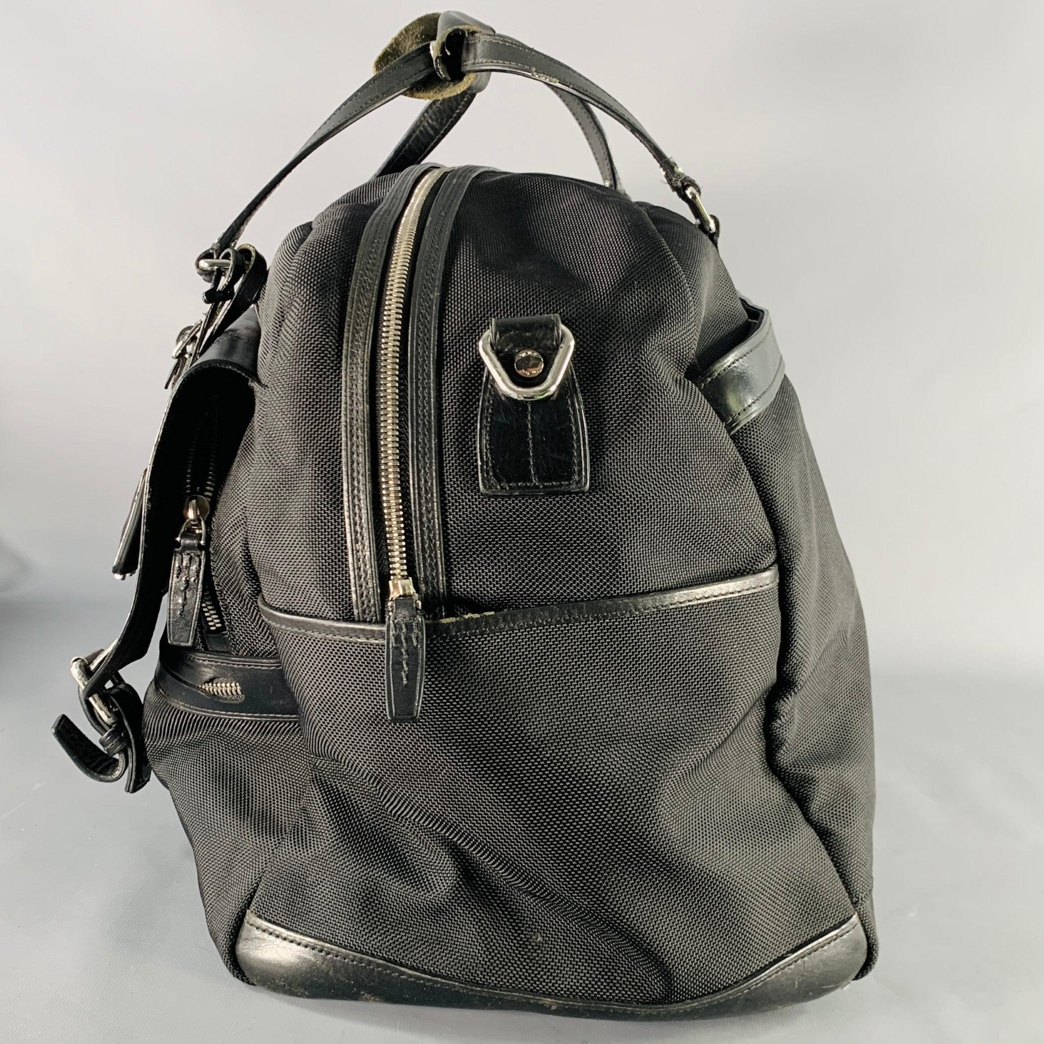 TUMI Bolsa de viaje con asas superiores de piel y nylon negro en Bueno estado para la venta en San Francisco, CA