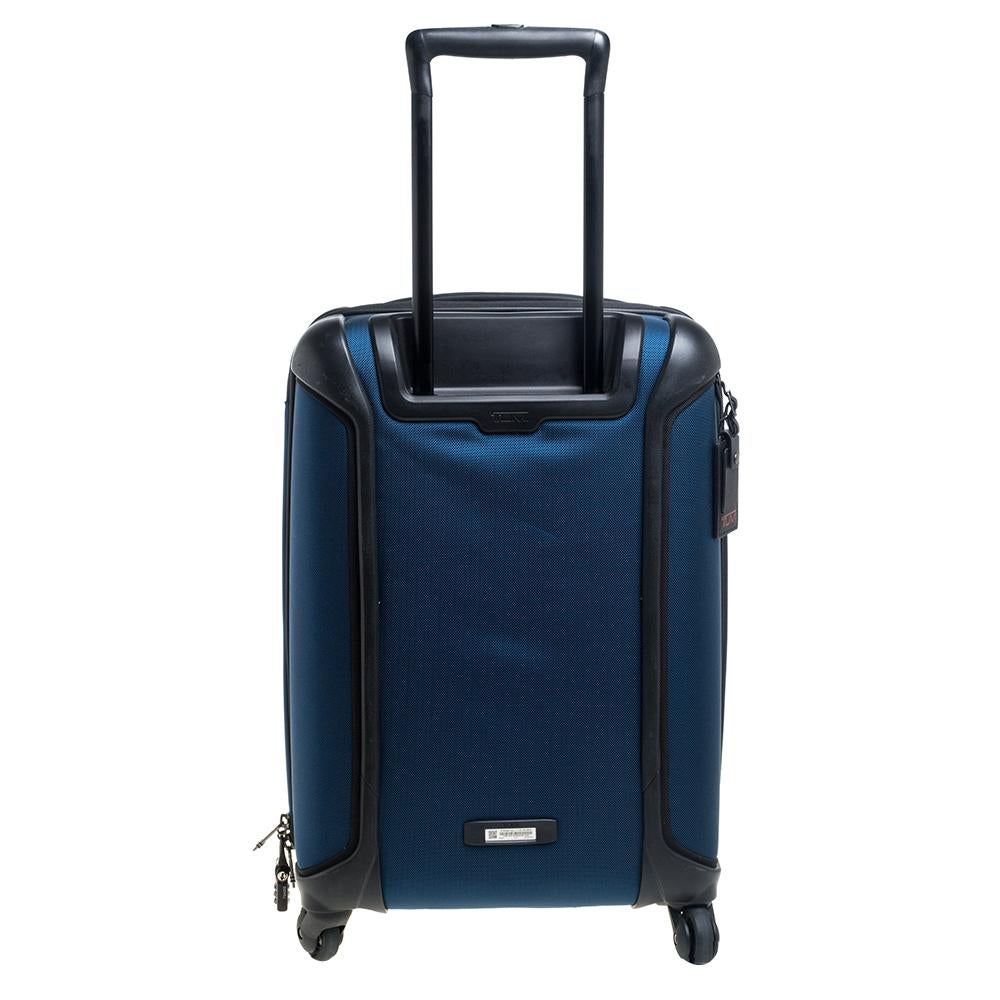 Employing high-grade materials and innovative construction to deliver impeccable products that aim at functional ease, TUMI is the brand travelers vouch for. This lightweight luggage case is crafted in nylon and equipped with multiple pockets, a