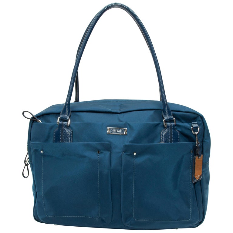 Tumi Blue Nylon Pocket Shoulder Bag at 1stDibs tumi sale, tumi handbags