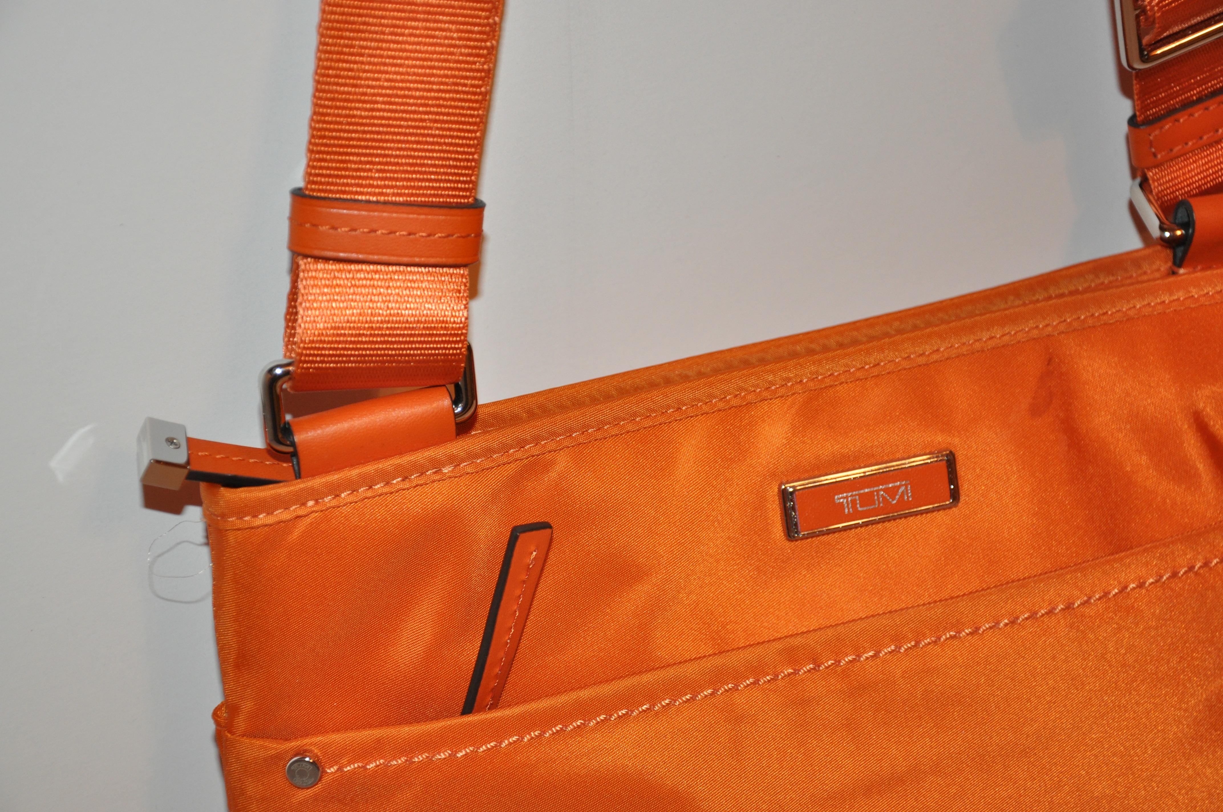 Women's or Men's Tumi Warm Tangerine Crossbody Shoulder Bag For Sale
