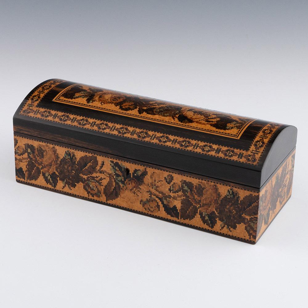 Heading : Tunbridge ware glove box by Thomas Barton c1870

Date : c1870

Period : Victoria

Origin :  Tunbridge Wells, Kent

Decoration : Dome topped with Berlin-woolwork mosaic to centre within keylines. Chain link type border also within keylines.
