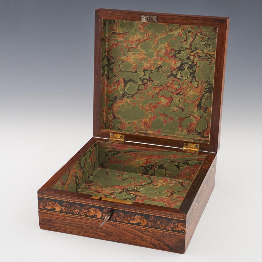 Heading : Tunbridge ware handkerchief box
Date : c1880
Period : Victoria
Origin : Tunbridge Wells, Kent
Decoration : Central perspective cube pattern within keylines, floral berlin woolwork border also within keylines. The side panels are also