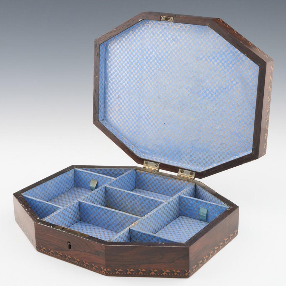 Heading : Tunbridge ware sewing box
Date : c1840
Period : Victoria
Origin : Tunbridge Wells, Kent
Decoration : Central perspective cube pattern with geometric stickwear borders within keylines. Cover with geometric border also within keylines. Side