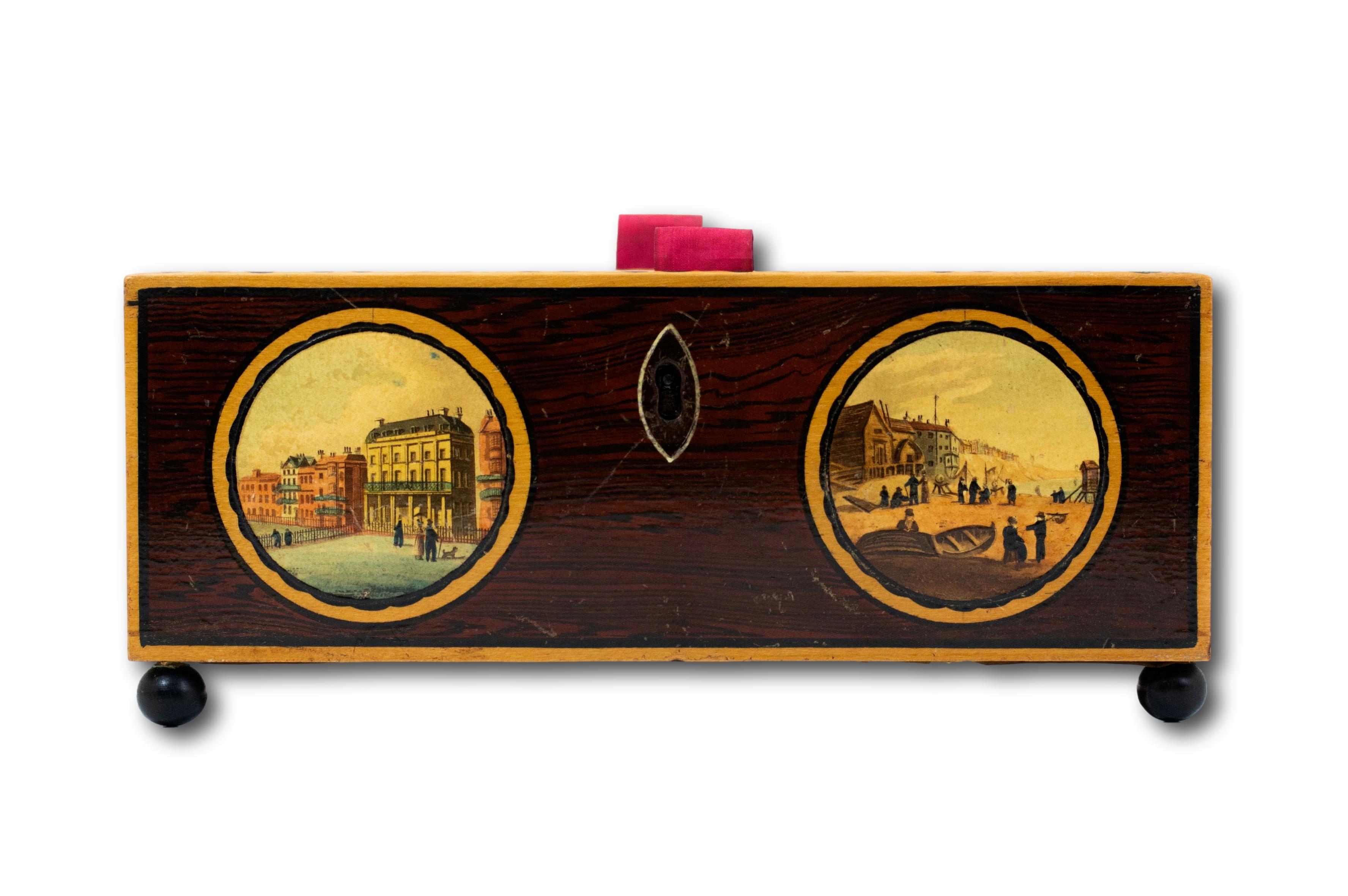 Featuring Multiple Scenes of Brighton

From our Sewing Box collection, we are pleased to offer this Tunbridge ware box. The box of rectangular shape elevated upon four ball feet features several scenes from Brighton including the Pavillions and the